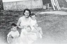  ??  ?? Phyllis Cooper In the backyard of her mother’s house in St. John’s around 1958. The children (from left) are her sons Randy and Terry and their cousin, Steve Angel.