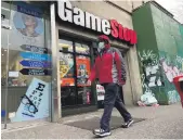  ?? Reuters ?? A GameStop shop in New York. The company hired three executives to drive its push into e-commerce