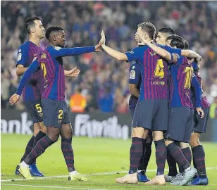  ?? VALENTÍ ENRICH ?? El Barça vuelve a ser el líder tras ganar al Sevilla //