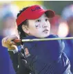  ?? Aurelien Meunier / Getty Images 2018 ?? Lucy Li, 16, of Redwood City, a top amateur golfer, appears in an Apple Watch video ad.