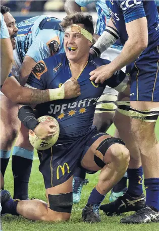  ?? PHOTO: PETER MCINTOSH ?? On the board . . . Otago No 8 Dylan Nel celebrates after scoring his try against Northland during the ITM Cup rugby match between Otago and Northland at the Forsyth Barr Stadium last night.