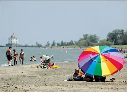  ?? FILE PHOTO ?? A view of Headlands Beach State Park, with the Fairport Harbor lighthouse in the background