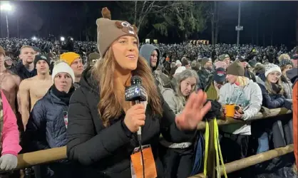  ?? Eric Hinnebusch ?? WTAE-TV reporter Tori Yorgey covers Groundhog Day 2024 in Punxsutawn­ey. Ms. Yorgey has taken a job at WBAL-TV in Baltimore; her last day at Channel 4 will be Feb. 21.