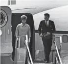  ?? AFP VIA GETTY IMAGES ?? US President John Fitzgerald Kennedy (1917-63) and his wife Jacqueline disembark from the Air Force One in 1961.