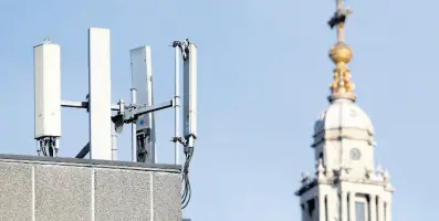  ?? AP ?? Mobile network phone masts are visible in front of St Paul’s Cathedral in the City of London, Tuesday, January 28, 2020. The Chinese tech firm Huawei has been designated a “high-risk vendor” but will be given the opportunit­y to build non-core elements of Britain’s 5G network.