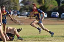  ??  ?? Austin Jennings finds himself in open space. Jennings has had a taste of TRL A-Grade experience with the Gatton Hawks in the outside backs.