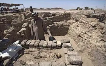  ??  ?? Archaeolog­ists have uncovered the remains of an ancient city in the desert outside Luxor that they say is the "largest" ever found in Egypt and dates back to a golden age of the pharaohs 3,000 years ago