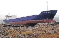  ??  ?? SCRAPPED: The officer on watch was drunk when the Lysblink
Seaways ran aground at Ardnamurch­an.