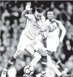  ?? — Reuters photo ?? Manchester City’s Gabriel Jesus (left) in action with Brighton’s Dale Stephens during the English Premier League match at Etihad Stadium in Manchester, Britain in this May 9 file photo.