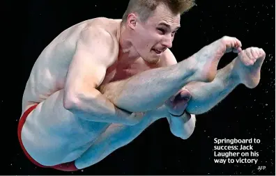  ?? AFP ?? Springboar­d to success: Jack Laugher on his way to victory