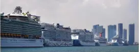  ?? (Carlos Barria/Reuters) ?? CRUISE SHIPS are seen docked at Miami port, last month.