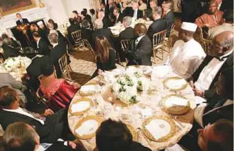  ?? Reuters ?? Former US president George W. Bush (left) speaks during an iftar dinner at the White House on October 17, 2005.