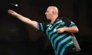  ?? Zac Goodwin/PA ?? Rob Cross was not at his sharpest against Thibault Tricole but was still able to seal a 3-0 victory to reach the third round. Photograph: