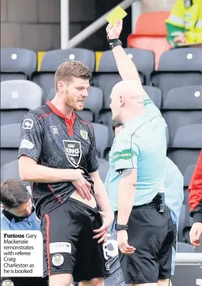 ??  ?? Furious Gary Mackenzie remonstrat­es with referee Craig Charleston as he is booked