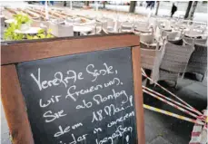  ?? FOTO: MARIJAN MURAT/DPA ?? Die baden-württember­gische Landesregi­erung plant, der Gastronomi­e im Land vom 18. Mai an schrittwei­se die Öffnung zu erlauben.