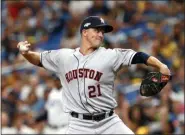  ?? SCOTT AUDETTE — THE ASSOCIATED PRESS ?? Astros pitcher Zack Greinke throws during the first inning of Game 3 of the American League Division Series against the Rays in St. Petersburg, Fla., on Monday.