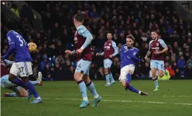  ?? Photograph: Anna Gowthorpe/Shuttersto­ck ?? James Maddison curls his shot home for Leicester’s first after help from Jamie Vardy.