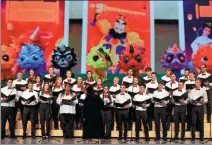  ?? WANG LEI / CHINA NEWS SERVICE ?? Members of the Chinese Choir of the German high school Burg Gymnasium get together with Chinese peers to sing at a concert held in Chengdu, Sichuan province, in April.