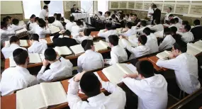  ?? (Yaakov Cohen/Flash90) ?? HAREDI YESHIVA students: These 135,000 boys, and then men, and then senior citizens, who will also not pay health tax, will place a heavy burden on the health care system in around 60 years’ time.