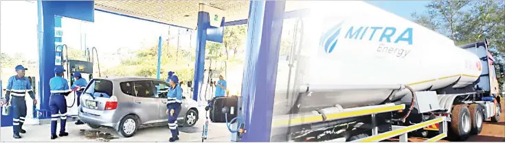  ?? (Courtesy pics) ?? Mitra Energy Eswatini staff serving a customer. Mitra also offers fuel transporta­tion services.