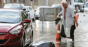  ??  ?? The city of Miami Beach, Florida, is regularly hit by floods caused by high tides, an ominous sign of rising sea levels.