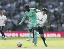  ?? ?? Yves Bissouma holds off Heung-Min Son