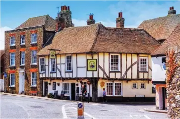  ?? Picture:ALAMY ?? Kent through the ages: The centre of Sandwich is lined with many historic buildings