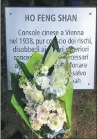  ?? PHOTOS BY CECILY LIU/CHINA DAILY ?? Ho Manli, daughter of Ho Feng Shan, meets Italian children who visited the Garden of Monte Stella on March 14 to honor humanitari­an heroes. Right: A stone plaque in the Garden of Monte Stella in Milan honors Ho.