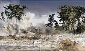  ??  ?? Tsunami waves hitting the coast of Minamisoma in Fukushima prefecture on March 11, 2011 Photograph: JIJI PRESS/AFP/Getty Images