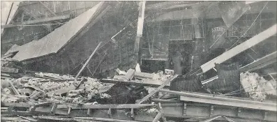  ??  ?? RUINS: This is Blythes Department store (where the old Farmers used to be) towards the top of Emerson St. The lack of building strength is apparent, and this photo was taken before the fires. Buried beneath this rubble are a number of victims.