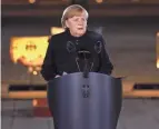  ?? ODD ANDERSEN/POOL VIA AP ?? “Get vaccinated, no matter whether it’s a first vaccinatio­n or a booster,” German Chancellor Angela Merkel said Saturday. “Every vaccinatio­n helps.”