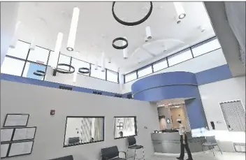  ?? PHOTO BY RandY HOeFT/YUMA SUN ?? A SECURITY OFFICER passes through the main lobby at Exceptiona­l Community Hospital Monday morning.