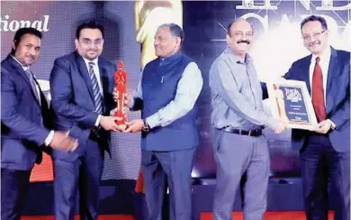  ?? ?? Raveen Pinto, Pratik Mehta and Fletcher Samuel from BIAL receive an award during the India Cargo Awards