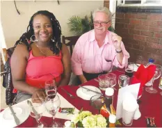  ??  ?? Two of Harare's real wine experts Lillian Mugwagwa of BrandsAfri­ca and Tim Garrard of Moldon Marketing