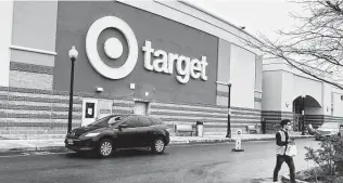  ?? Ted Shaffrey / Associated Press ?? Target will no longer open its stores on Thanksgivi­ng Day, making permanent a shift to the unofficial start of the holiday season that was suspended during the pandemic.