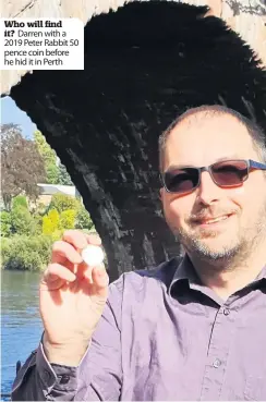  ??  ?? Who will find it? Darren with a 2019 Peter Rabbit 50 pence coin before he hid it in Perth