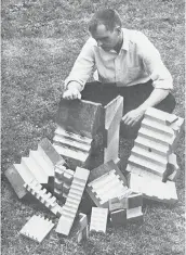  ?? HOLLIS FRAMPTON Art Copyright Carl Andre/Artists Rights Society (ARS), Dia Art Foundation, New York ?? Artist Carl Andre with Radial Arm Saw-Cut Sculptures, 1959-1960.