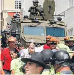  ??  ?? Hundredsof­protesters­weremarchi­ng when the car drove into a them.