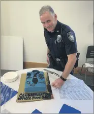  ?? PHOTO COURTESY OF LANSDALE POLICE DEPARTMENT ?? Retiring Lansdale police Officer James Owens poses during a farewell reception in honor of his retirement on Sept. 15.