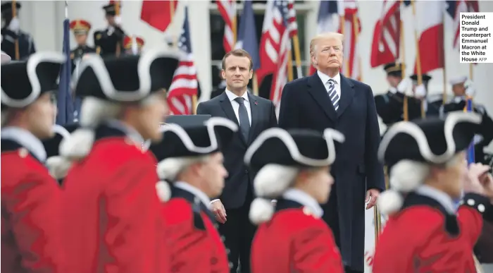  ?? AFP ?? President Donald Trump and counterpar­t Emmanuel Macron at the White House