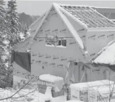  ??  ?? The Jeanneault family home, still incomplete, sits outside Sudbury, Ont.