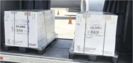  ??  ?? 65,000 doses of the Astrazenec­a vaccine arrived at the Norman Manley Internatio­nal Airport from Mexico yesterday.