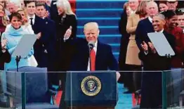  ?? AP ?? Trump after being sworn in as the 45th US president. He was sworn in by Chief Justice John Roberts, reciting the 35-word oath with his hand placed upon two Bibles, one used by his family and another during President Abraham Lincoln’s inaugurati­on.