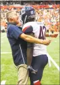  ?? Rich Barnes / Getty Images ?? UConn coach Randy Edsall reacts to a missed tackle with player T.J. Gardner.