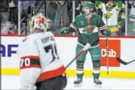  ?? Matt Kroh The Associated Press ?? Minnesota Wild center Vinni Lettieri, right, celebrates his goal against the Ottawa Senators during the third period.