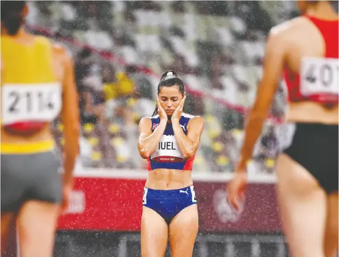  ?? DYLAN MARTINEZ / REUTERS ?? Amalie Iuel of Norway reacts after making a false start during a semifinal of the women’s 400-metre hurdles.