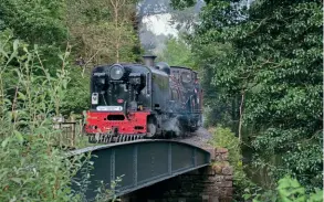  ??  ?? Garratt No. 87 crosses Plas y Nant bridge with an August 18 service train.