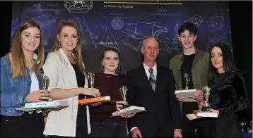  ??  ?? Senior Award winners Caoilinn Dunne, Niamh Quigley, Katie McMahon, Daniel O’Rourke and Renée McGlynn receive their awards from Ray Kelly at the Bush Post Primary Annual School Awards.