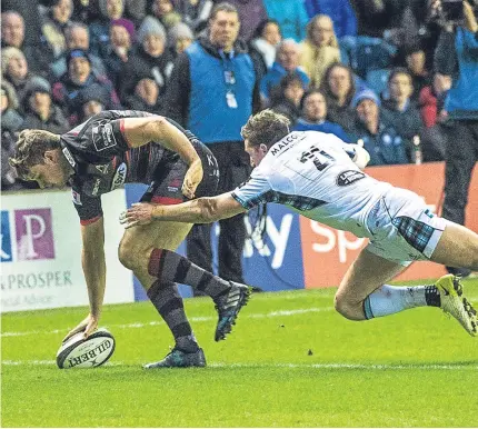  ?? SNS. ?? Chris Dean scores Edinburgh’s winning try; below – Stuart Mcinally says the best is yet to come.