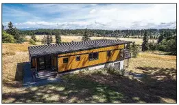  ?? Dale Tu ?? This 2Mshift house on Camano Island, Wash., was designed by Prentiss Balance Wickline Architects and built by Method Homes.